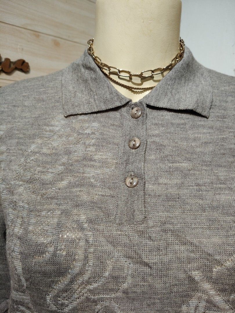 Mocka Giene Grey Knit Polo Sweater M-L No issues (Category: Longsleeves) located in Bulacan. Submitted by alyssarys (Listing ID 1470535546, Image 3). Description: - Brand/Model: Mocks Giene - Size: M-L - Color: Grey - Material: Lightweight stretch knit - Details: Collared neckline, button placket, ribbed cuffs and hem - Style: Clean look, versatile for pairing with skirts or trousers.