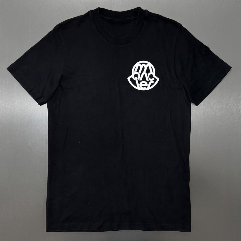 MONCLER Black Graphic Print Tee (Category: Tshirts & Polo Shirts ) located in Davao. Submitted by ckkb1821 (Listing ID 1470366344, Image 1). Description: MONCLER Black Graphic Print Tee Medium (19 x 29"L) Excellent condition, no issue ₱2,499 only + SF.
