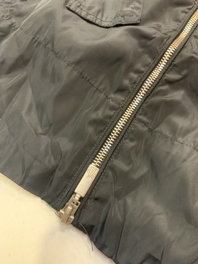 Moncler Black Hooded Windbreaker Jacket Size 3 (Category: Luxury Apparel) located in Tarlac. Submitted by luxurious_apparel (Listing ID 1470445266, Image 2). Description: - Authentic Moncler hooded windbreaker in classic black - Size: 3 (Marked on tag) - Full zip front with branded puller - Adjustable drawstring waist and elasticated cuffs - Iconic Moncler logo patch on the left sleeve - Lightweight and ideal for layering - Made in Armenia with i