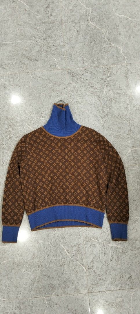 Monogram Pattern Turtleneck Sweater Blue Brown Size S (Category: Longsleeves) located in Bacolod City. Submitted by hurleydediamante0513 (Listing ID 1470372564, Image 1). Description: - Size: S - Design: Brown with all-over monogram pattern and contrasting blue ribbed collar, cuffs, and hemline - Material: 80% Australian wool, 20% pilling-resistant fibers (Made in China) - Care: Gentle hand or machine wash in cold water - Condition: Brand new wit