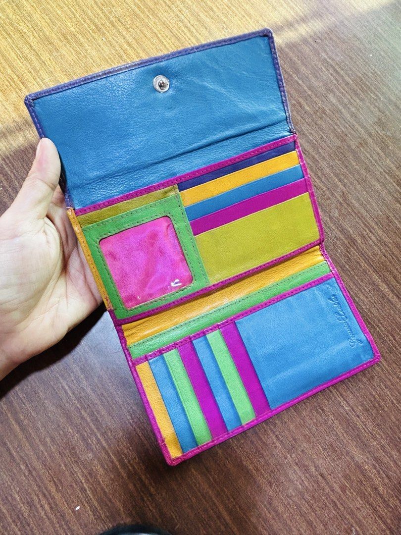 Multicolor Genuine Leather Long Wallet with Multiple Compartments (Category: Wallets & Card holders) located in Manila. Submitted by starbalesukandjapansurplus (Listing ID 1470555651, Image 3). Description: - Multi-colored genuine leather long wallet (blue, pink, yellow, green, and purple panels) - Secure front snap button closure - Multiple interior card slots, ID window, and slip pocket - Exterior backside zipped pocket and extra slot for quick