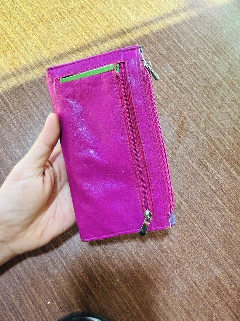 Multicolor Genuine Leather Long Wallet with Multiple Compartments (Category: Wallets & Card holders) located in Manila. Submitted by starbalesukandjapansurplus (Listing ID 1470555651, Image 2). Description: - Multi-colored genuine leather long wallet (blue, pink, yellow, green, and purple panels) - Secure front snap button closure - Multiple interior card slots, ID window, and slip pocket - Exterior backside zipped pocket and extra slot for quick