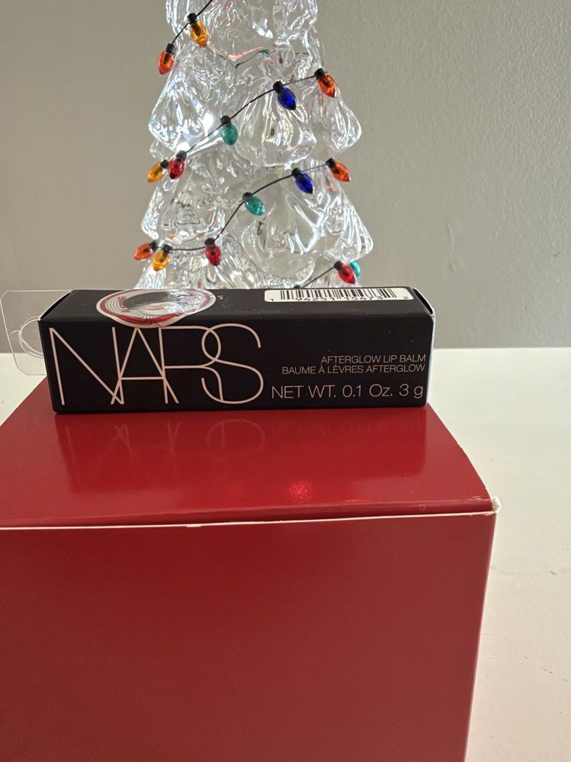 NARS Afterglow Lip Balm Orgasm 777 (Category: Makeup) located in Las Pinas. Submitted by trueflower_125fe9 (Listing ID 1470491644, Image 1). Description: - Brand: NARS - Product: Afterglow Lip Balm - Shade: Orgasm 777 (Classic warm pink with golden shimmer) - Size: Standard full-size, 0.1 oz / 3 grams - Condition: Brand new, sealed box, 100% unopened - Benefits: Hydrating formula infused with Monoi Hydration Complex and antioxidants - Guaranteed 