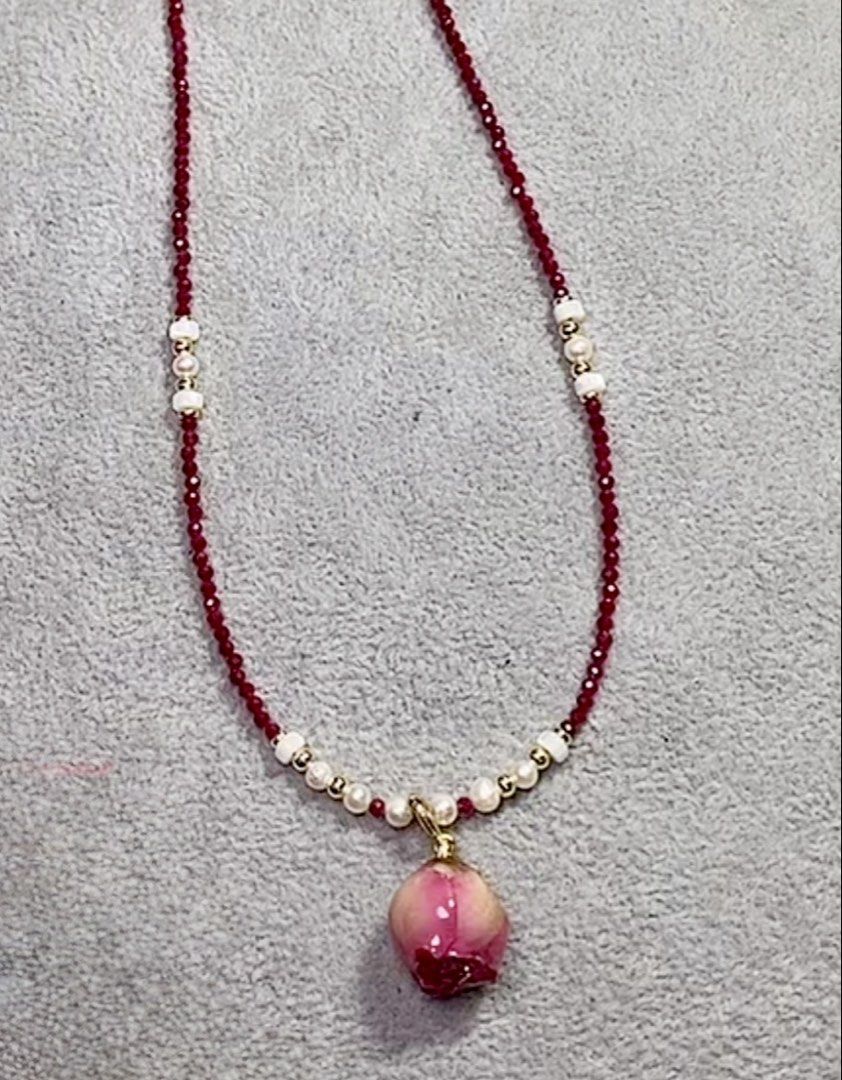 Natural Ruby necklace with rose (Category: Necklaces) located in Tagum. Submitted by shwzzzd (Listing ID 1470528619, Image 1). Description: Natural ruby necklace with rose pendant Natural ruby, shell and rose .