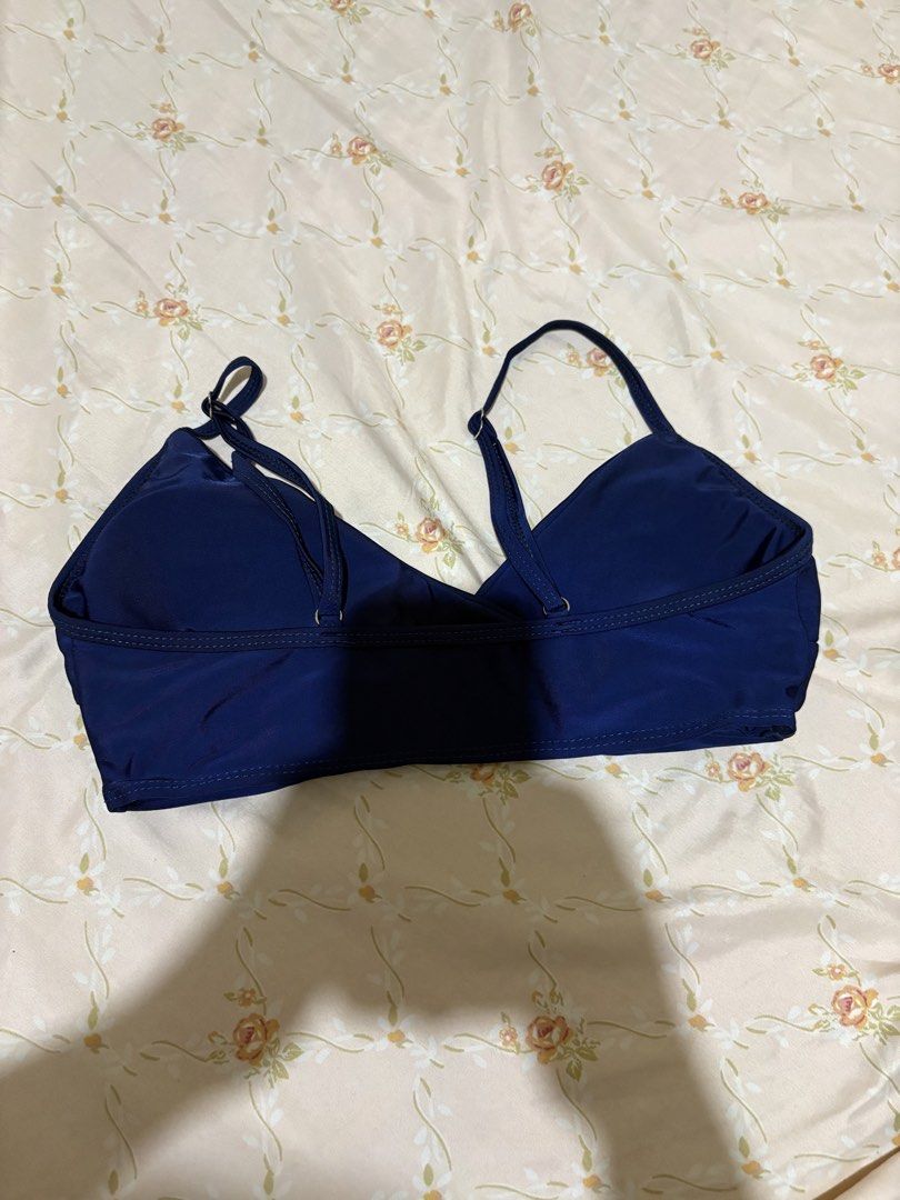Navy blue bikini top wrap style size S (Category: Bikinis & Swimsuits) located in Manila. Submitted by margascloset_ (Listing ID 1470490032, Image 2). Description: - Solid dark blue with a flattering wrap style - Size: Small (tag attached) - Features: Adjustable shoulder straps with metal hardware and removable cup padding .