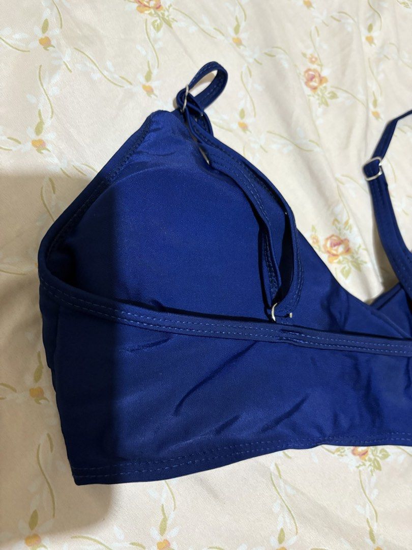 Navy blue bikini top wrap style size S (Category: Bikinis & Swimsuits) located in Manila. Submitted by margascloset_ (Listing ID 1470490032, Image 3). Description: - Solid dark blue with a flattering wrap style - Size: Small (tag attached) - Features: Adjustable shoulder straps with metal hardware and removable cup padding .