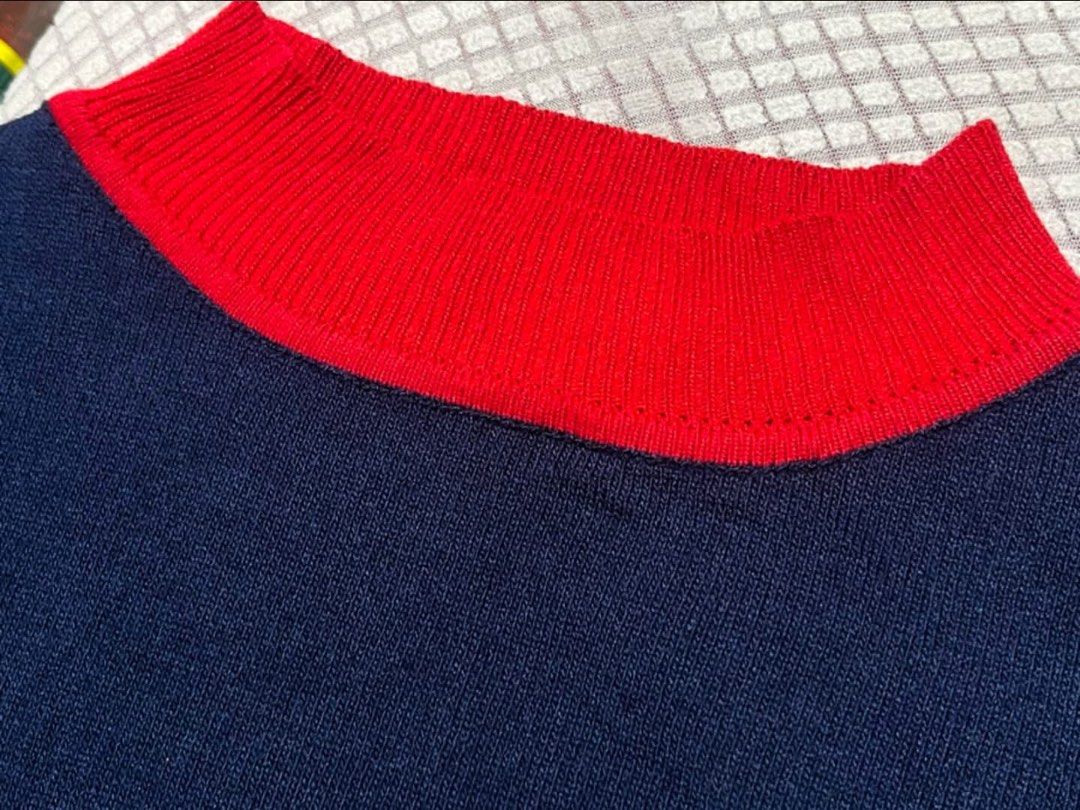 Navy blue Knit Basic Ringer shirt with red trims (Category: Shirts) located in Donsol. Submitted by saksthriftavenuebyluckymaria8 (Listing ID 1470394444, Image 3). Description: - Color: Tinted Navy Blue with Contrast Red Trim - Style: Fine knit basic t-shirt with ribbed crew neck and sleeve cuffs - Material: Soft textured knit fabric - Design: Clean minimalist style with a stylish pop color trim Navy blue knit ringer shirt with red trims Sz M che