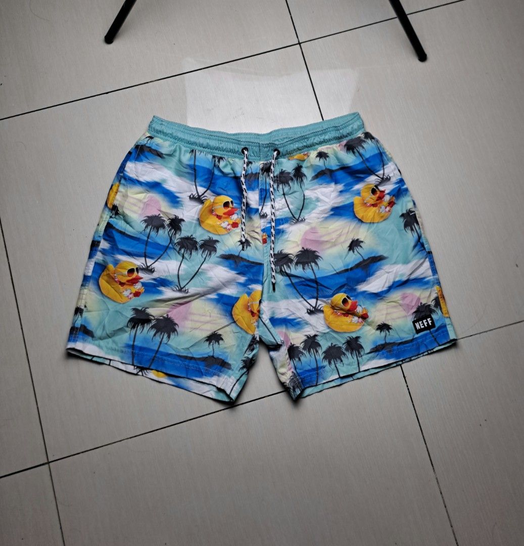 Neff Rubber Ducky Palm Tree Swim Trunks Large (Category: Swim Trunks & Board Shorts) located in General Santos City (Dadiangas). Submitted by shinra322 (Listing ID 1470379474, Image 1). Description: - Brand: Neff - Size: Large W32-36 L17.5 - Design: Blue and green tropical sunset with all-over rubber duckies in sunglasses and floral leis - Material: 100% polyester - Waistband: adjustable drawstring - Branding: Small black Neff logo patch on the l