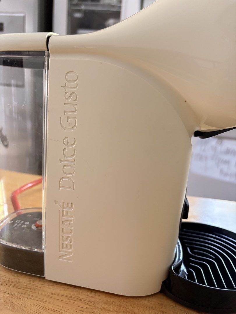 Nescafe Dolce Gusto Genio S Coffee Machine Cream (Category: Coffee Machines & Makers) located in Manila. Submitted by ch0431 (Listing ID 1470371670, Image 3). Description: Open for nego, make your offer - Model: Nescafe Dolce Gusto Genio S - Color: White but stained from being stocked - Condition: Clean and fully functional - Features: Intuitive digital control ring for volume and temperature adjustments - Design: Compact capsule machine with a c