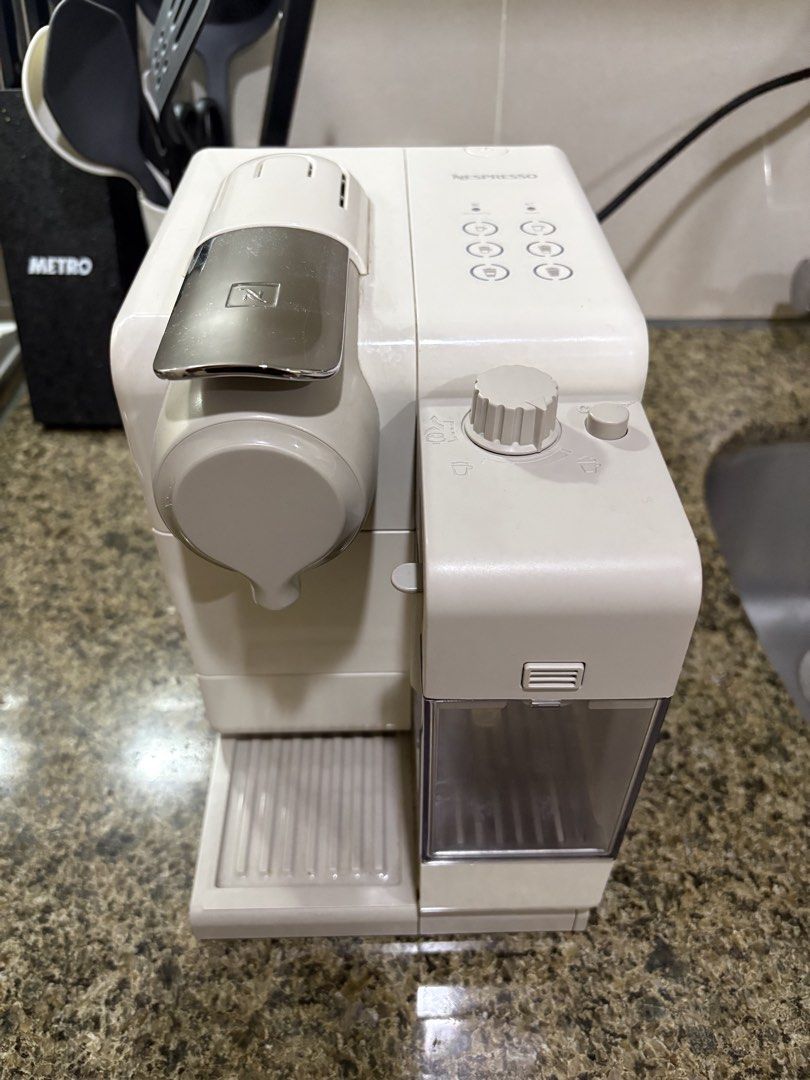 Nespresso Lattissima Touch Coffee Machine (Category: Coffee Machines & Makers) located in Pasig City. Submitted by carlameireyes (Listing ID 1470504156, Image 1). Description: Price: Php11,000 negotiable Model: Nespresso Lattisima Touch F521 Current state: Fully functional, no damage Usage: Bought in 2020, heavily used but no damage RFS: No longer using and need to declutter Other notes: Will need descaling, and we no longer have the box, but we 