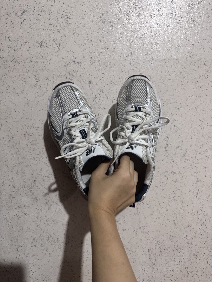 New Balance 530 White Silver Navy (Category: Sneakers) located in Quezon City. Submitted by patzyy (Listing ID 1470358019, Image 3). Description: - Model: New Balance 530 chunky sneakers - Colorway: Classic white and metallic silver with navy accents - Comfort: Breathable mesh upper with ABZORB midsole cushioning - Style: Trendy dad shoe look, highly versatile for daily outfits - Inclusion: Comes with original shoe box.