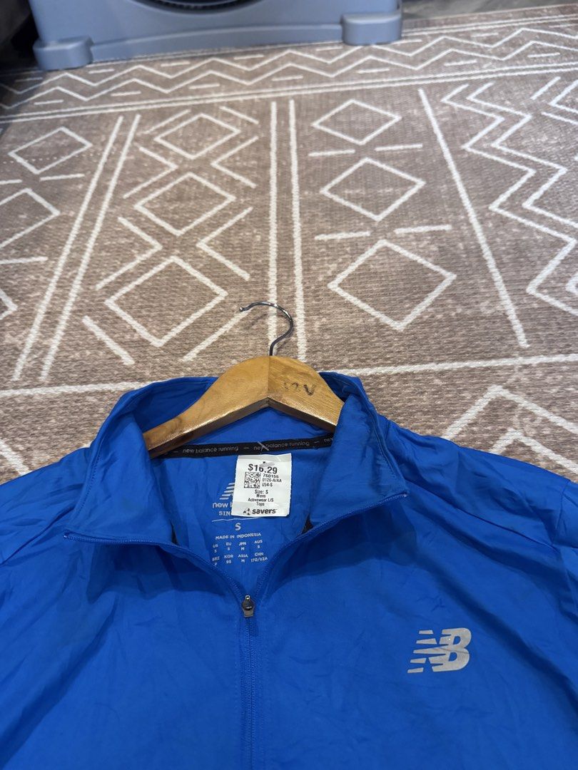 New Balance NB Dry Long Sleeve Activewear Pullover Size S (Category: Activewear) located in Bulacan. Submitted by zyannechlo86360 (Listing ID 1470364600, Image 2). Description: - Brand: New Balance - Style: Long sleeve athletic top with half-zip collar - Colorway: Blue, black, and light grey colorblock - Material: 87% polyester, 13% elastane with NB Dry technology - Size: Small (S) - Condition: Brand new with store tag attached 20x28 Excellenlt L