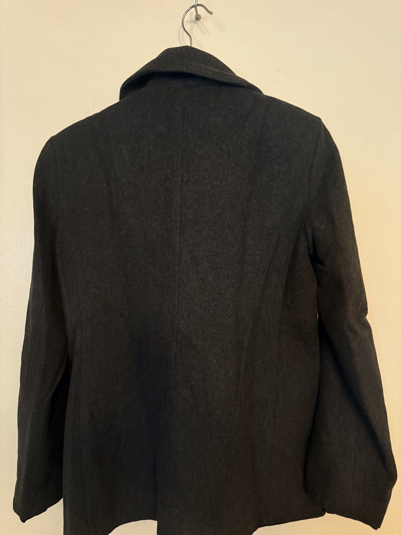 Dark Grey Winter Coat (Category: Coats, Jackets and Outerwear) located in Manila. Submitted by amdra25 (Listing ID 1470519397, Image 2). Description: - Brand: New York & Company - Style: Double-breasted pea coat with wide lapels and dark front buttons - Color: Dark grey - Fit: Structured through the back - Material: Warm wool blend, perfect for cold weather - Condition: Clean inside and out, well-maintained.