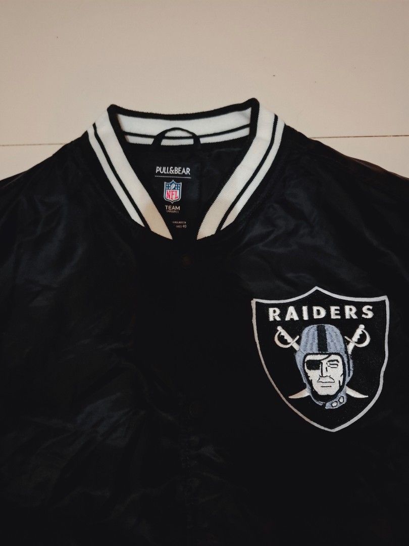 NFL x pull & bear las vegas raiders bomber/varsity jacket (Category: Coats, Jackets and Outerwear) located in Narvacan. Submitted by jigger85_2ndaccount (Listing ID 1470487384, Image 3). Description: NFL x pull & bear las vegas raiders varsity bomber jacket like new 9.9/10 condition no issues size: xl on tag dimes: 23 x 27 can fit to large to xl bought in UK location: ilocos sur cab ship thru JNT or LBC.