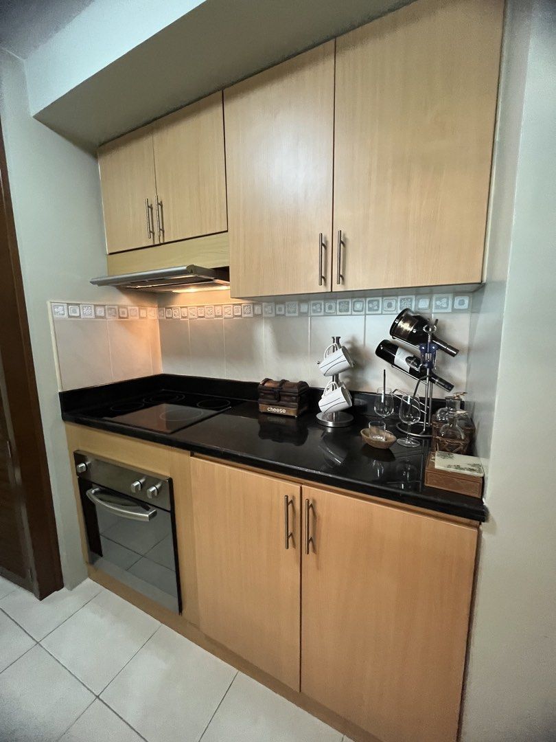 Nicely Interiored fresh 1BR Two Serendra midrise with parking (Category: Apartments & Condos) located in Taguig. Submitted by dengarces (Listing ID 1470413644, Image 2). Description: Never been tenanted; well maintained unit with premium furniture.