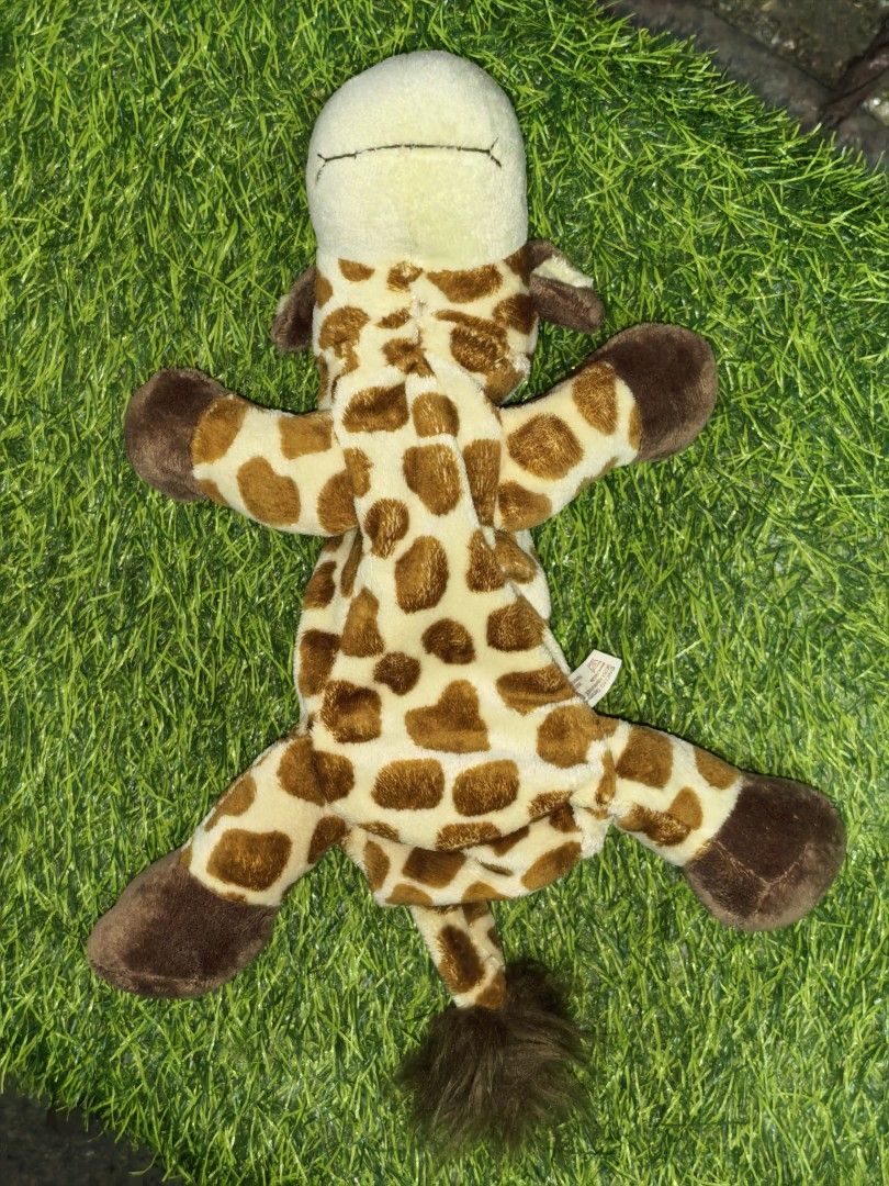 Nici Giraffe Plush Pencil Case (Category: Plushies & Soft Toys) located in Paranaque City. Submitted by furugiyafinds (Listing ID 1470455902, Image 2). Description: - Authentic Nici giraffe plush pencil case - Features cute brown spots and a fluffy mane - Secure zip closure along the front - Smooth golden-brown interior lining for pens and stationery - Soft and huggable plush material - Original Nici tag attached.