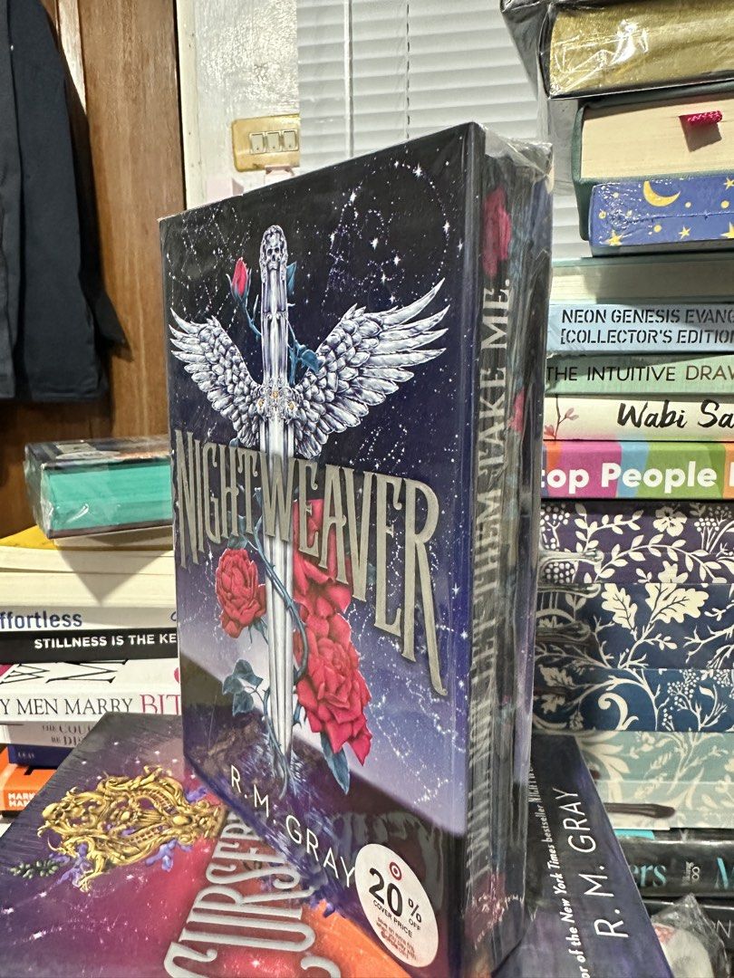 Nightweaver by R.M. Gray Special Edition (Category: Storybooks) located in Paranaque City. Submitted by chikugo (Listing ID 1470450220, Image 1). Description: - Title: Nightweaver by R.M. Gray - Format: Hardcover novel - Condition: Brand new Remaindered Copy - Design: Dark fantasy art, silver foil title, and winged sword with red roses - Storage: Properly stored on a bookshelf - Perfect for fantasy book collectors Location: Moonwalk Paranaque MOP