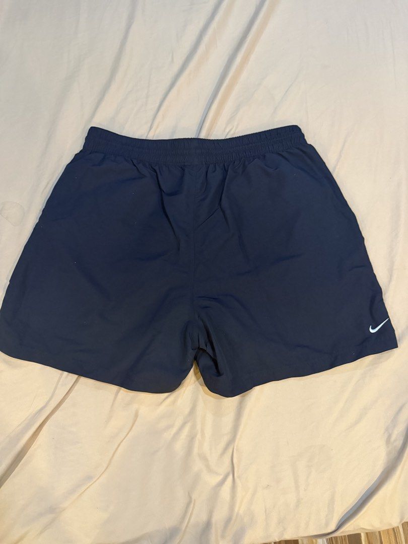 Nike ACG Black Shorts Size L (Category: Shorts) located in Caloocan City. Submitted by markarbuso66733 (Listing ID 1470481756, Image 1). Description: - Brand: Nike ACG - Color: Black - Size: L - Condition: Clean, excellent overall condition - Material: Lightweight fabric, perfect for hiking and casual wear - Features: Elastic waistband with drawstring, zippered side pockets with toggle cords, and front right metal loop - Branding: Classic embroid