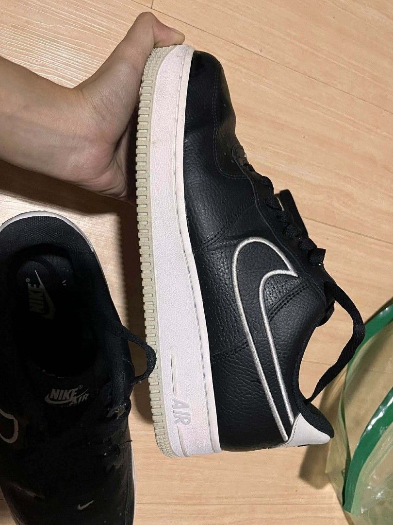 Nike Air Force 1 Black White Sneakers (Category: Sneakers) located in Sagñay. Submitted by goldenbird.261ce7 (Listing ID 1470514723, Image 3). Description: - Color: Black with white midsoles and contrast piping - Design: Classic low-top with black laces and embroidered Nike Air tongue branding - Material: Durable leather upper with a breathable perforated toe box - Fit: Standard fit - Condition/Usage: Versatile daily wear shoes, ready to ship!.