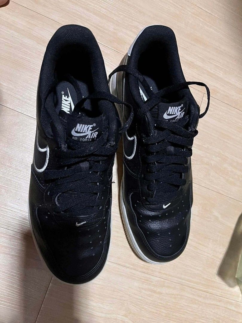 Nike Air Force 1 Black White Sneakers (Category: Sneakers) located in Sagñay. Submitted by goldenbird.261ce7 (Listing ID 1470514723, Image 1). Description: - Color: Black with white midsoles and contrast piping - Design: Classic low-top with black laces and embroidered Nike Air tongue branding - Material: Durable leather upper with a breathable perforated toe box - Fit: Standard fit - Condition/Usage: Versatile daily wear shoes, ready to ship!.