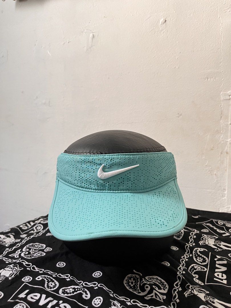 Nike athletic visor (Category: Hats & Beanies) located in Cagayan de Oro. Submitted by vigo999 (Listing ID 1470411703, Image 1). Description: Nike athletic visor Adjustable Strap Condition: Excellent Color rate: 9/10 Issue: minimal dents see the last picture OSFA.