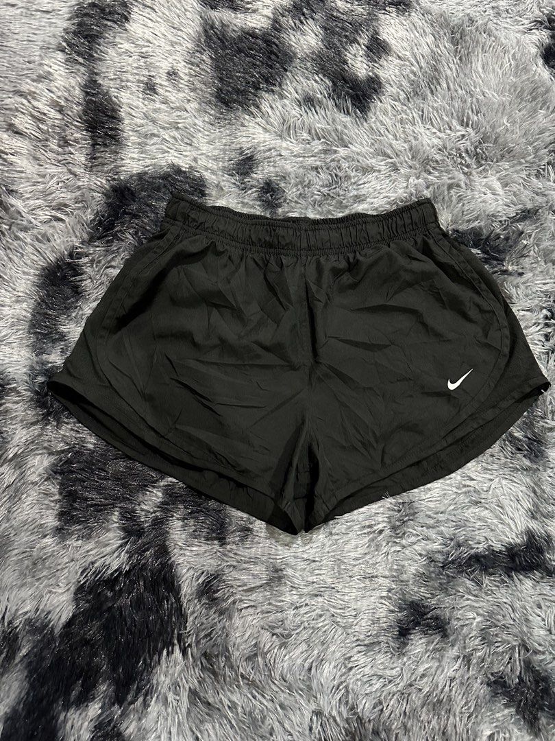 Nike Black Athletic Shorts (Category: Activewear) located in Iba. Submitted by thriftcoyan (Listing ID 1470490594, Image 1). Description: - Brand: Nike -Size 28-31 -Length 10 - Color: Classic black - Design: White Nike Swoosh logo on lower right leg - Comfort: Elastic waistband with comfy stretch and inner brief lining - Material: Lightweight fabric, ideal for workouts or casual lounging - Condition: cut tag pero excellent condition.