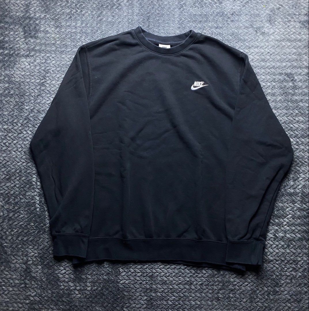 Nike Black Crewneck Sweatshirt (Category: Coats, Jackets and Outerwear) located in Olongapo. Submitted by WAVYT (Listing ID 1470552408, Image 1). Description: - Brand: Nike - Style/Model: BV2667-010 - Color: Black with embroidered white logo - Size: XL - Fit: Classic pullover with ribbed cuffs and hem - Material: Comfortable everyday wear - Condition: Excellent / Pre-loved - Origin: Made in China - Shipping: Nationwide via J&T or LBC - Meet-ups: 