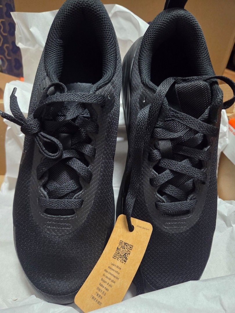 Nike Black Sneakers with Tag (Category: Sneakers) located in Manila. Submitted by anneclariceyanga (Listing ID 1470517038, Image 3). Description: Available size Women- 8, 8.5, 9 Men- 8.5 - Brand: Nike - Color: Black - Condition: Brand new, never worn outside (with original box) - Material: Breathable mesh upper with a thick sculpted sole - Features: Original laces attached, brown tag still on the shoe, completely clean sole and fabric.