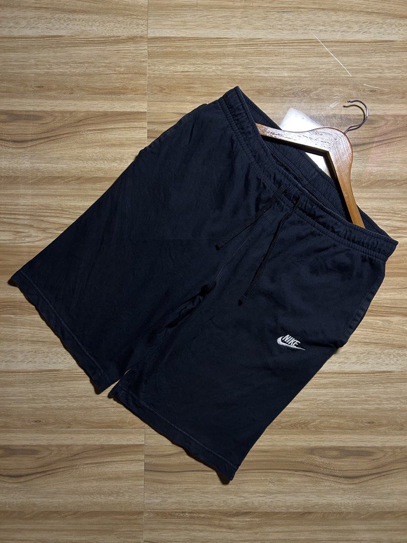 Nike Black Sweatshorts with Drawstring Size XL (Category: Shorts) located in Tarlac. Submitted by selfmade_legacy (Listing ID 1470374668, Image 2). Description: - Brand: Nike - Item: Sweatshorts - Color: Black - Size: XL - Material: 100% Cotton (Made in China) - Features: Elastic waistband with adjustable drawstring, small white embroidered Nike logo on left hem, one back pocket on the right - Condition: Clean, minimal wear - Perfect for casual w