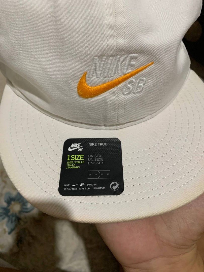 nike cap (Category: Activewear) located in Bula. Submitted by justinejar75338 (Listing ID 1470486053, Image 2). Description: Nike Sb orange swoosh cap one size fits all excellent condition color rate 9.5/10 issue minimal yellow stain need wash only 8h free shipped 📩📩📩.
