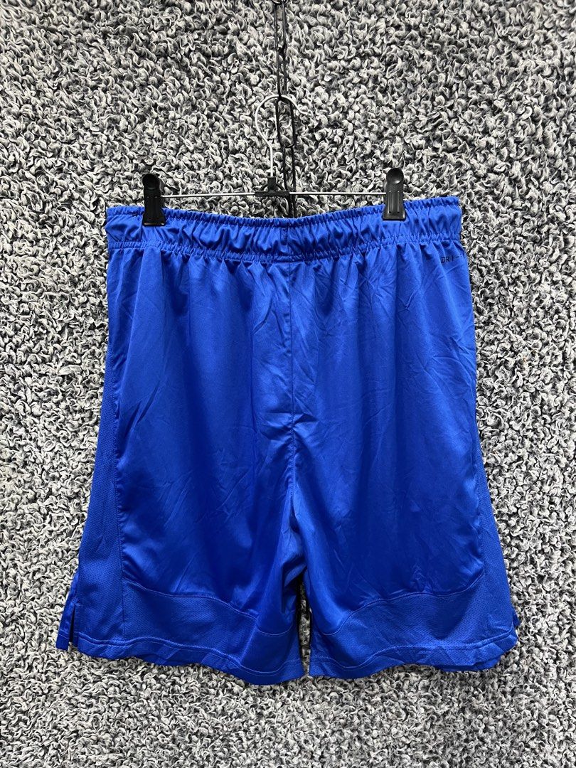 Nike Dri-FIT athletic performance shorts | Size L (Category: Shorts) located in General Trias. Submitted by zrchustle.604 (Listing ID 1470499935, Image 3). Description: Nike Dri-FIT athletic performance shorts in royal blue, featuring an elastic waistband and the signature Nike Swoosh branding on the left leg.