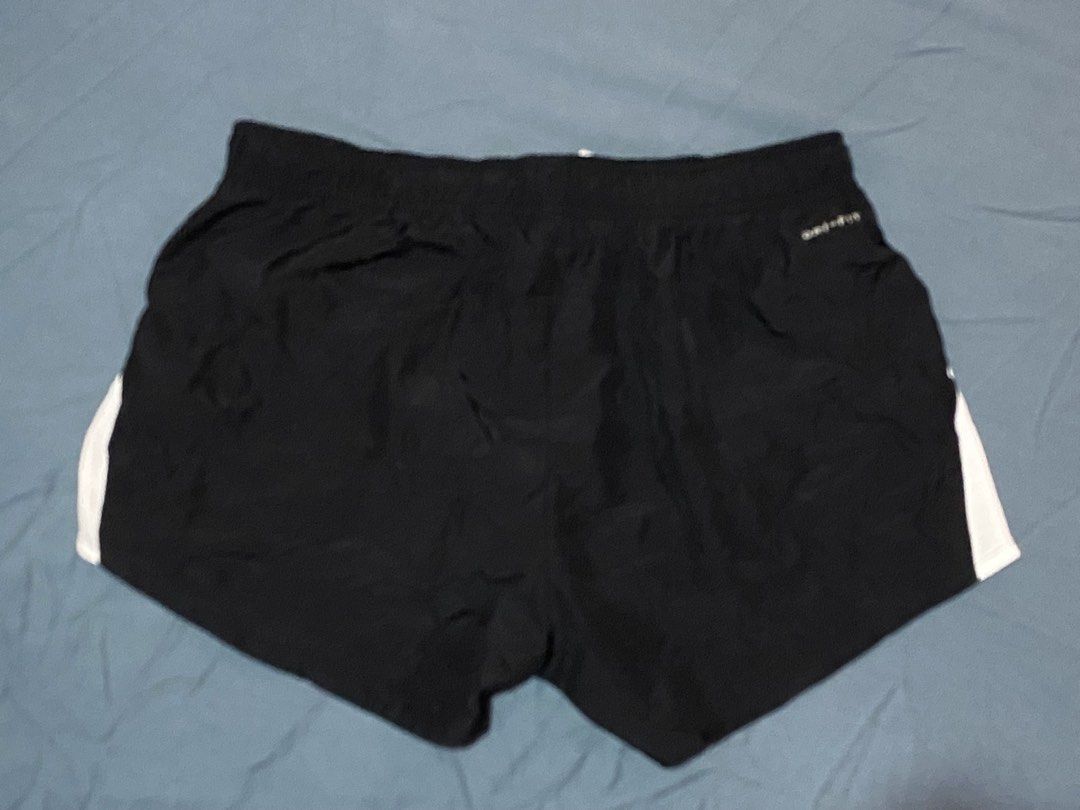 Nike Dri-FIT Black Running Shorts Size M (Category: Shorts) located in Cagayan de Oro. Submitted by ohh-kay (Listing ID 1470391180, Image 3). Description: - Brand: Nike - Item: Dri-FIT Running Shorts - Color: Black - Size: Medium / 26-30 waist / length 10” - Material: 100% recycled polyester (lightweight and breathable) - Features: Elastic waistband with white adjustable drawstring, white mesh side panels - Condition: Clean, excellent overall con