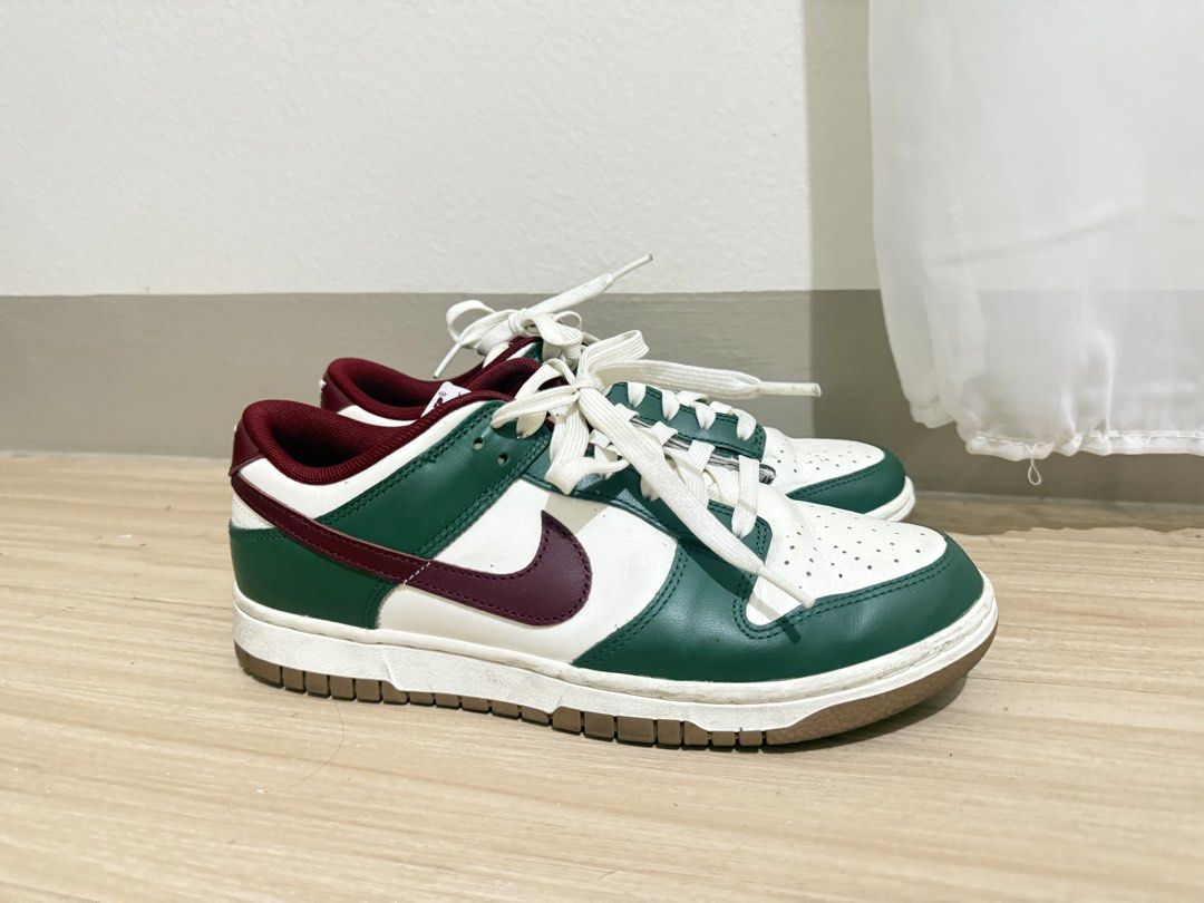 Nike Dunk Low Green Burgundy (Category: Sneakers) located in Manila. Submitted by goldenfish.dc5c9f (Listing ID 1470431518, Image 2). Description: Nike Dunk Low - Colorway: Green and white leather upper with burgundy swooshes and collar lining - Details: White laces and durable brown outsoles - Condition: Clean pair overall with slight wear on the midsoles - l.