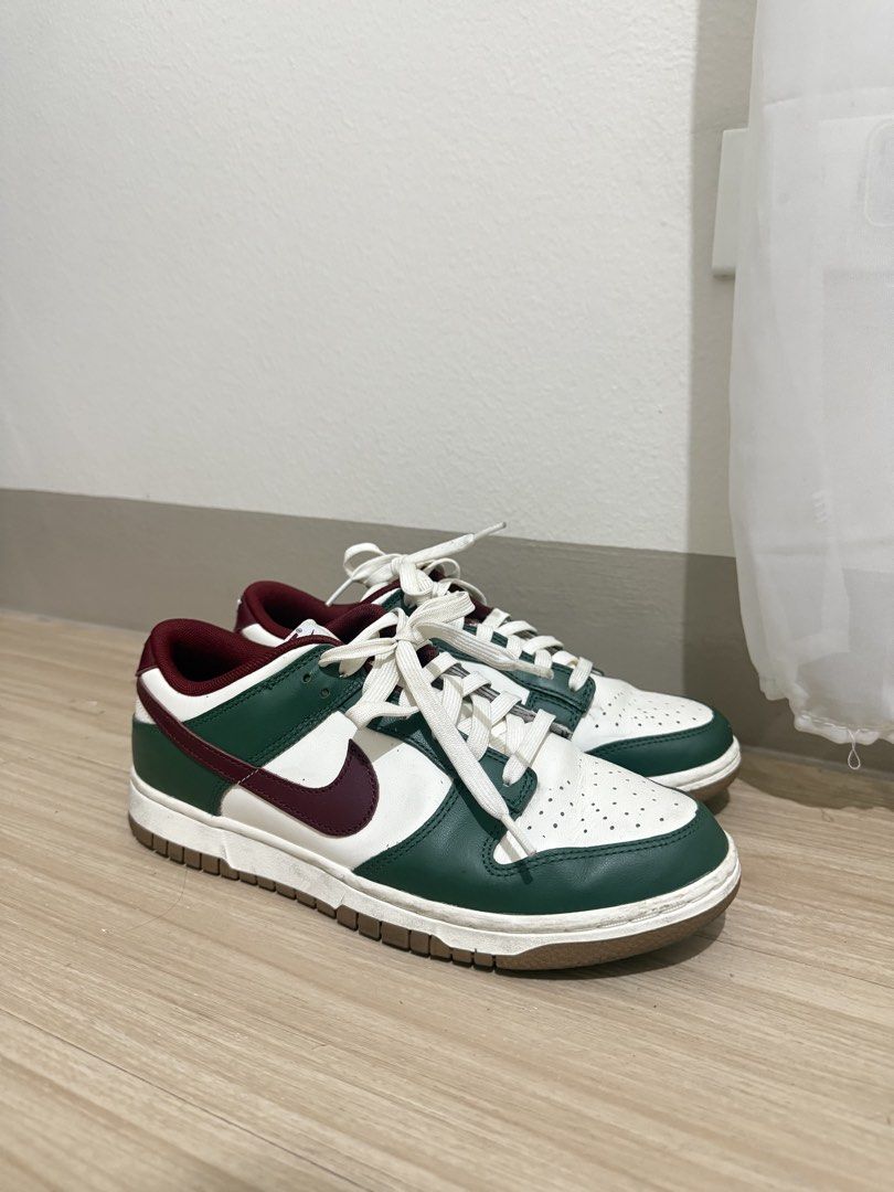 Nike Dunk Low Green Burgundy (Category: Sneakers) located in Manila. Submitted by goldenfish.dc5c9f (Listing ID 1470431518, Image 1). Description: Nike Dunk Low - Colorway: Green and white leather upper with burgundy swooshes and collar lining - Details: White laces and durable brown outsoles - Condition: Clean pair overall with slight wear on the midsoles - l.
