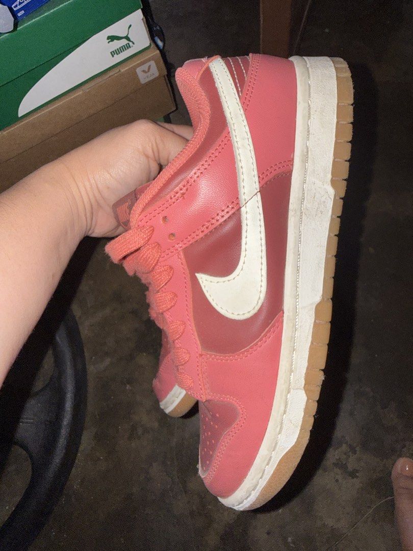 Nike Dunk Low Pink Gum Soles (Category: Sneakers) located in Cabuyao City. Submitted by just_buy2316 (Listing ID 1470386628, Image 3). Description: Nike Dunk Low sneakers in pink with white swooshes and gum soles. Size US 7 / EUR 38. Worn a few times, soles have normal dirt from walking outside. Uppers are clean, leather has gentle creasing near the toes. Laces tied loosely. Great everyday rotation shoe, comfortable fit..