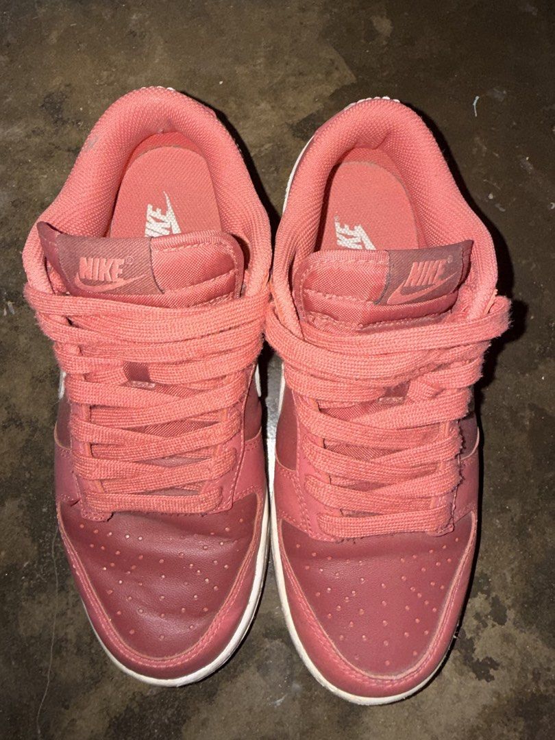 Nike Dunk Low Pink Gum Soles (Category: Sneakers) located in Cabuyao City. Submitted by just_buy2316 (Listing ID 1470386628, Image 2). Description: Nike Dunk Low sneakers in pink with white swooshes and gum soles. Size US 7 / EUR 38. Worn a few times, soles have normal dirt from walking outside. Uppers are clean, leather has gentle creasing near the toes. Laces tied loosely. Great everyday rotation shoe, comfortable fit..