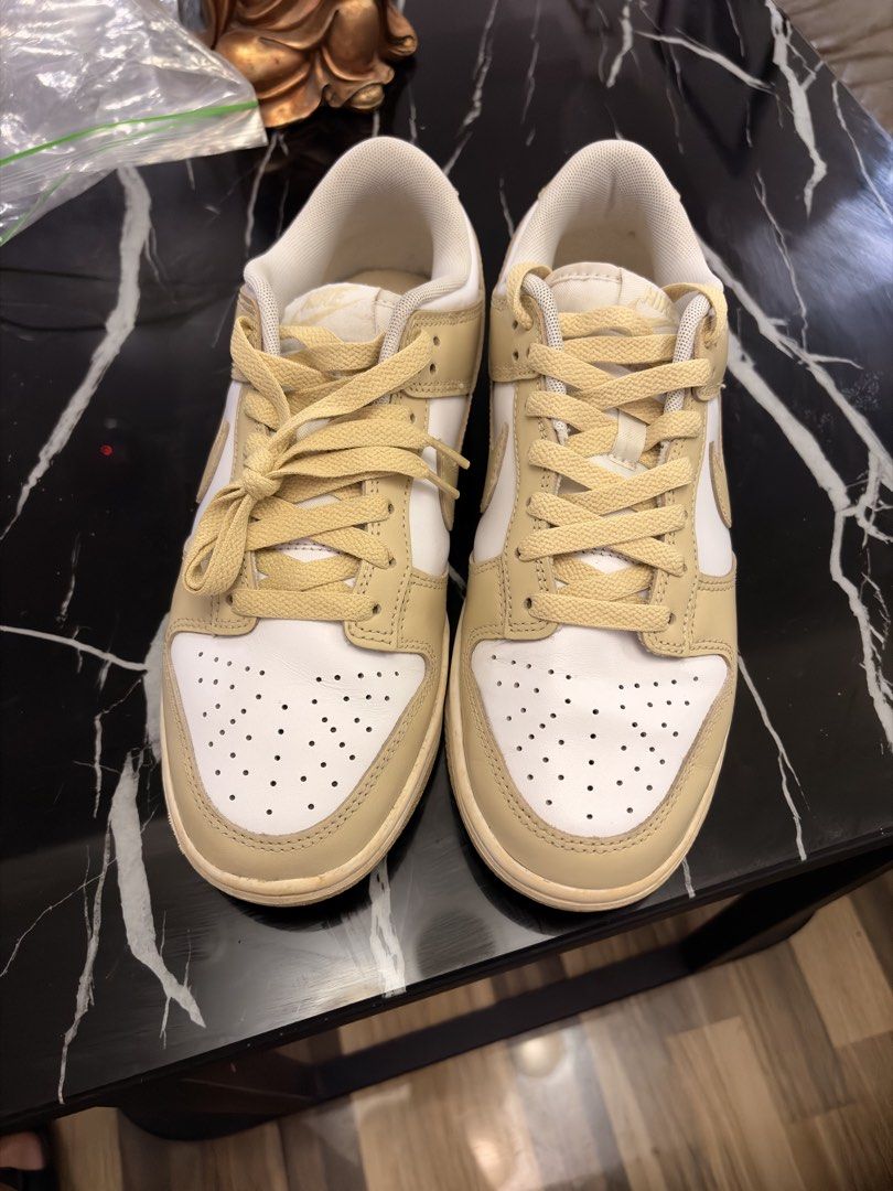 Nike Dunk Low Yellow / White Sneakers (Category: Sneakers) located in General Trias. Submitted by markyeffinp (Listing ID 1470415882, Image 1). Description: - Brand/Model: Nike Dunk Low - Colorway: White and Gold/Pale yellow - Style: Classic low-top with perforated toe box - Condition: Uppers are clean; soles show minor yellowing due to storage and not being used. - Features: Comfortable everyday sneakers, great for daily rotation Shipping via J&