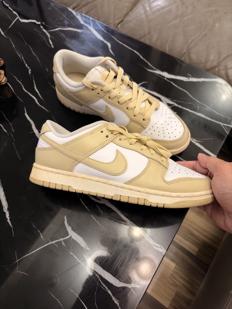 Nike Dunk Low Yellow / White Sneakers (Category: Sneakers) located in General Trias. Submitted by markyeffinp (Listing ID 1470415882, Image 3). Description: - Brand/Model: Nike Dunk Low - Colorway: White and Gold/Pale yellow - Style: Classic low-top with perforated toe box - Condition: Uppers are clean; soles show minor yellowing due to storage and not being used. - Features: Comfortable everyday sneakers, great for daily rotation Shipping via J&