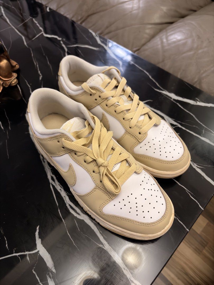 Nike Dunk Low Yellow / White Sneakers (Category: Sneakers) located in General Trias. Submitted by markyeffinp (Listing ID 1470415882, Image 2). Description: - Brand/Model: Nike Dunk Low - Colorway: White and Gold/Pale yellow - Style: Classic low-top with perforated toe box - Condition: Uppers are clean; soles show minor yellowing due to storage and not being used. - Features: Comfortable everyday sneakers, great for daily rotation Shipping via J&