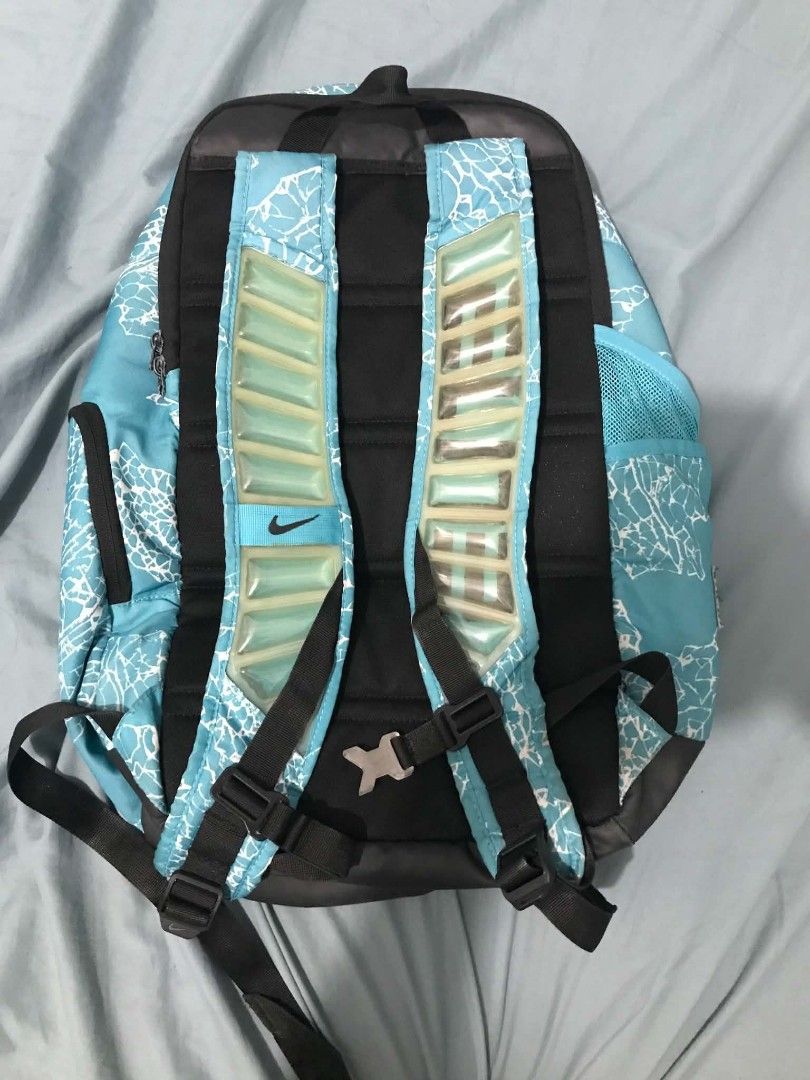 Nike Elite Backpack V2 (Category: Backpacks) located in Muntinlupa City. Submitted by royalstone.53e03d (Listing ID 1470516911, Image 2). Description: - Authentic Nike backpack in bright blue with a stylish white crackle graphic - Comfortable Air Max gel-injected shoulder straps and secure sternum strap buckle - Features multiple zippered pockets on the front and sides for great organization - Durable black base panel for added protection - Clean