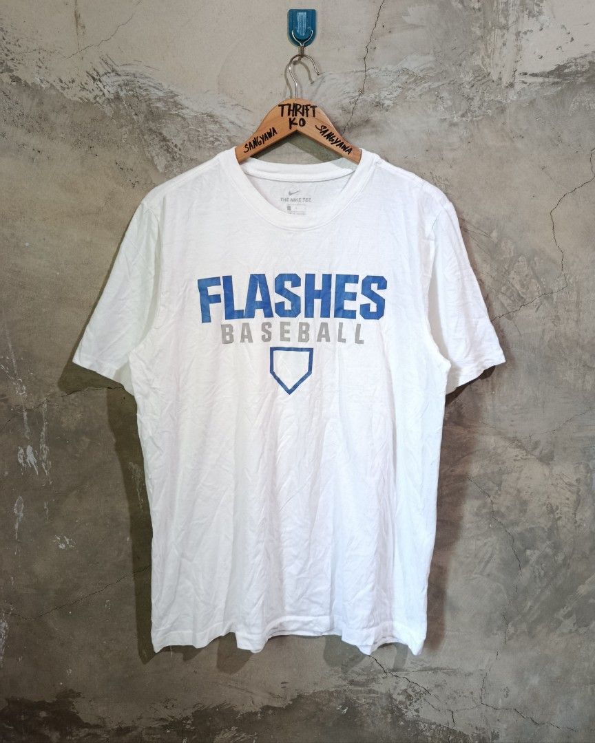 Nike Flashes Baseball White T-Shirt Large (Category: Tshirts & Polo Shirts ) located in Kalamansig. Submitted by skone1996 (Listing ID 1470554817, Image 1). Description: - Brand: Nike - Style: Flashes Baseball graphic tee, standard crewneck - Size: Large - 21 Width - 28 Length - 10/10 Color rate - No Issue - Color: White with blue and grey chest print - Details: Small Swoosh under front neckline, printed black Swoosh on upper back - Origin: Made 