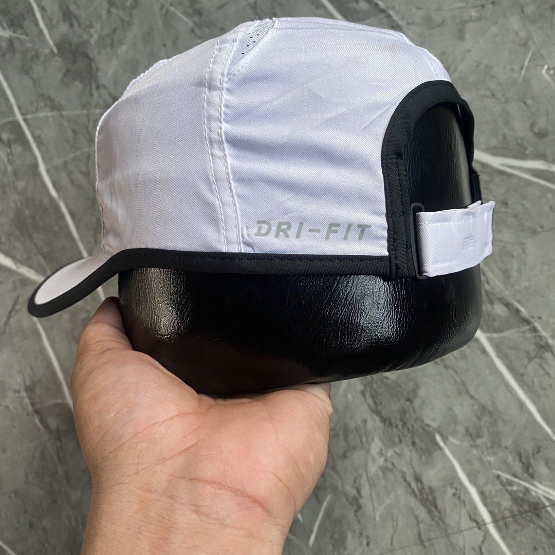 Nike Golf Cap (Category: Caps & Hats) located in Naga. Submitted by wanderingtreasures.ph1 (Listing ID 1470464475, Image 3). Description: Nike Unstructured Cap Condition 9.8/10 Color rate 10/10 Authentic Drifit Sweat-wicking fabric Stretchable Adjustable strapback Rubberized logo Featherlight vents on the head to keep you stay cool OSFA No issues (need wash) php + sf 📩.