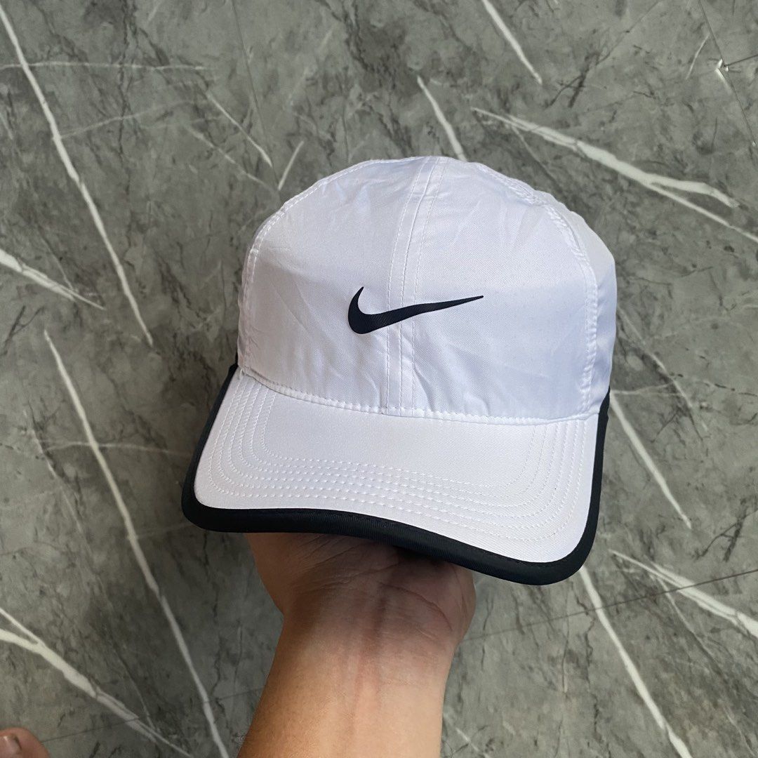 Nike Golf Cap (Category: Caps & Hats) located in Naga. Submitted by wanderingtreasures.ph1 (Listing ID 1470464475, Image 1). Description: Nike Unstructured Cap Condition 9.8/10 Color rate 10/10 Authentic Drifit Sweat-wicking fabric Stretchable Adjustable strapback Rubberized logo Featherlight vents on the head to keep you stay cool OSFA No issues (need wash) php + sf 📩.