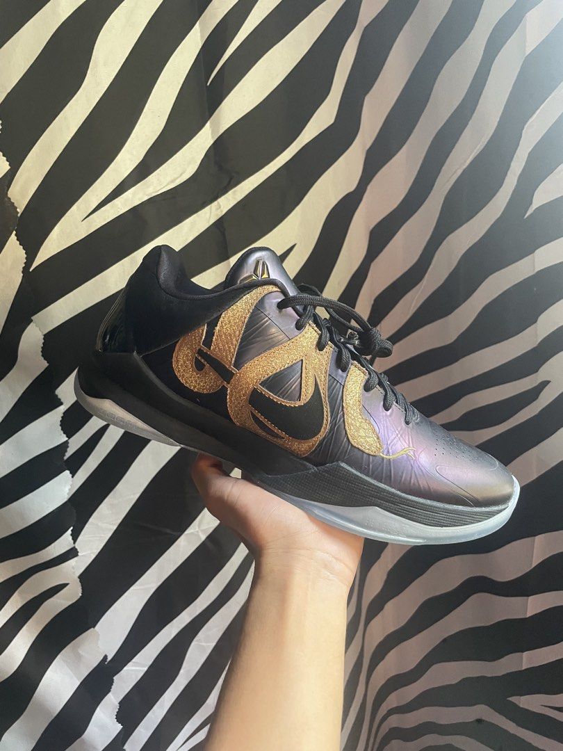 Nike Kobe 5 Protro “Eggplant” (Category: Sneakers) located in San Pedro. Submitted by mharemilvalencia (Listing ID 1470507518, Image 3). Description: - Brand: Nike Kobe 5 Protro -used 2x only (missing tote bag) - Details: Iridescent panels, signature multi-swoosh lateral side - Performance: Translucent rubber outsole with carbon fiber plate and Kobe sheath logo - Condition: Clean pair, ready for the court or collection - Packaging: Original red b