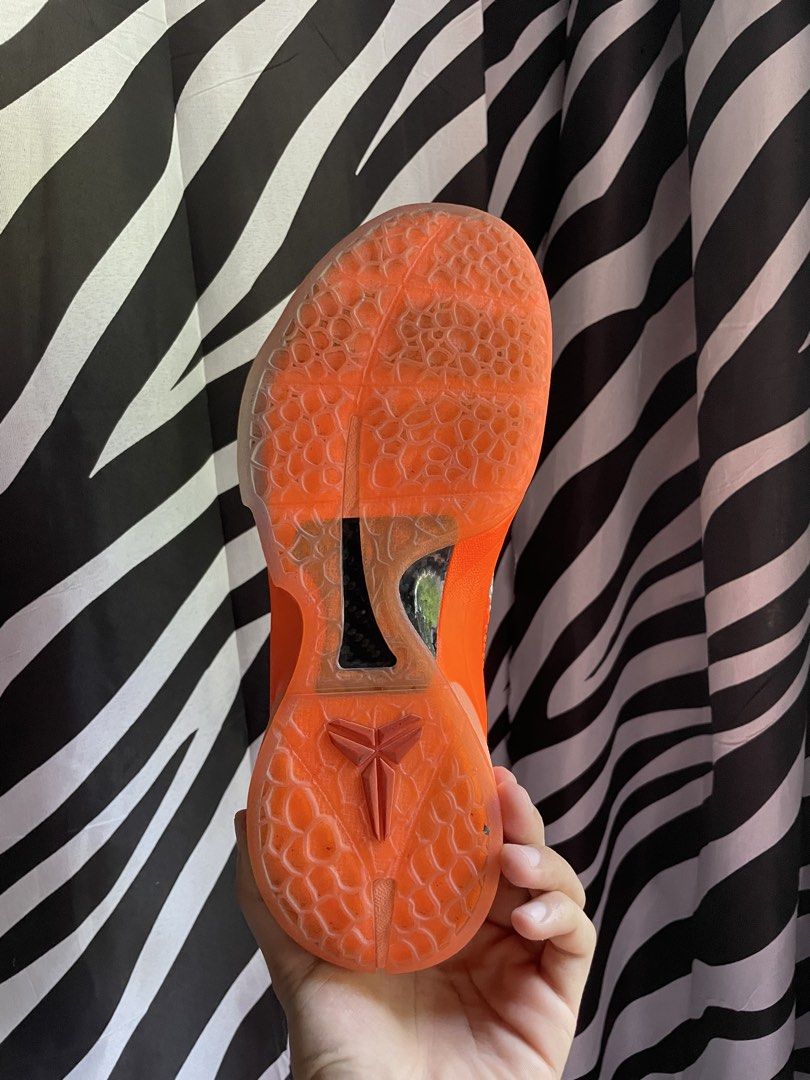 Nike Kobe 6 Protro Orange (Category: Sneakers) located in San Pedro. Submitted by mharemilvalencia (Listing ID 1470506876, Image 3). Description: - Model: Nike Kobe 6 Protro -used 3x Complete - Colorway: Vibrant Orange with Silver Swoosh - Design: Iconic snakeskin texture upper and signature Kobe branding on tongue and outsole - Sole: Translucent orange rubber sole with high-performance traction pattern - Packaging: Includes original shoe box - C