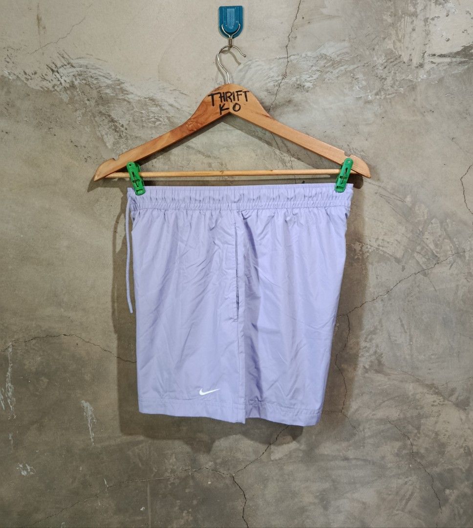 Nike Light Purple Drawstring Shorts (Category: Shorts) located in Kalamansig. Submitted by skone1996 (Listing ID 1470430223, Image 2). Description: - Brand: Nike - Color: Light Purple - Size: Medium - 28-32 Waistline - 14.5 Length - 10/10 Color rate - No issue - Style Code: FV7558-533 - Features: Drawstring waistband, breathable inner mesh lining, and embroidered white Nike swoosh near the hem - Condition: Clean, smoke-free home.