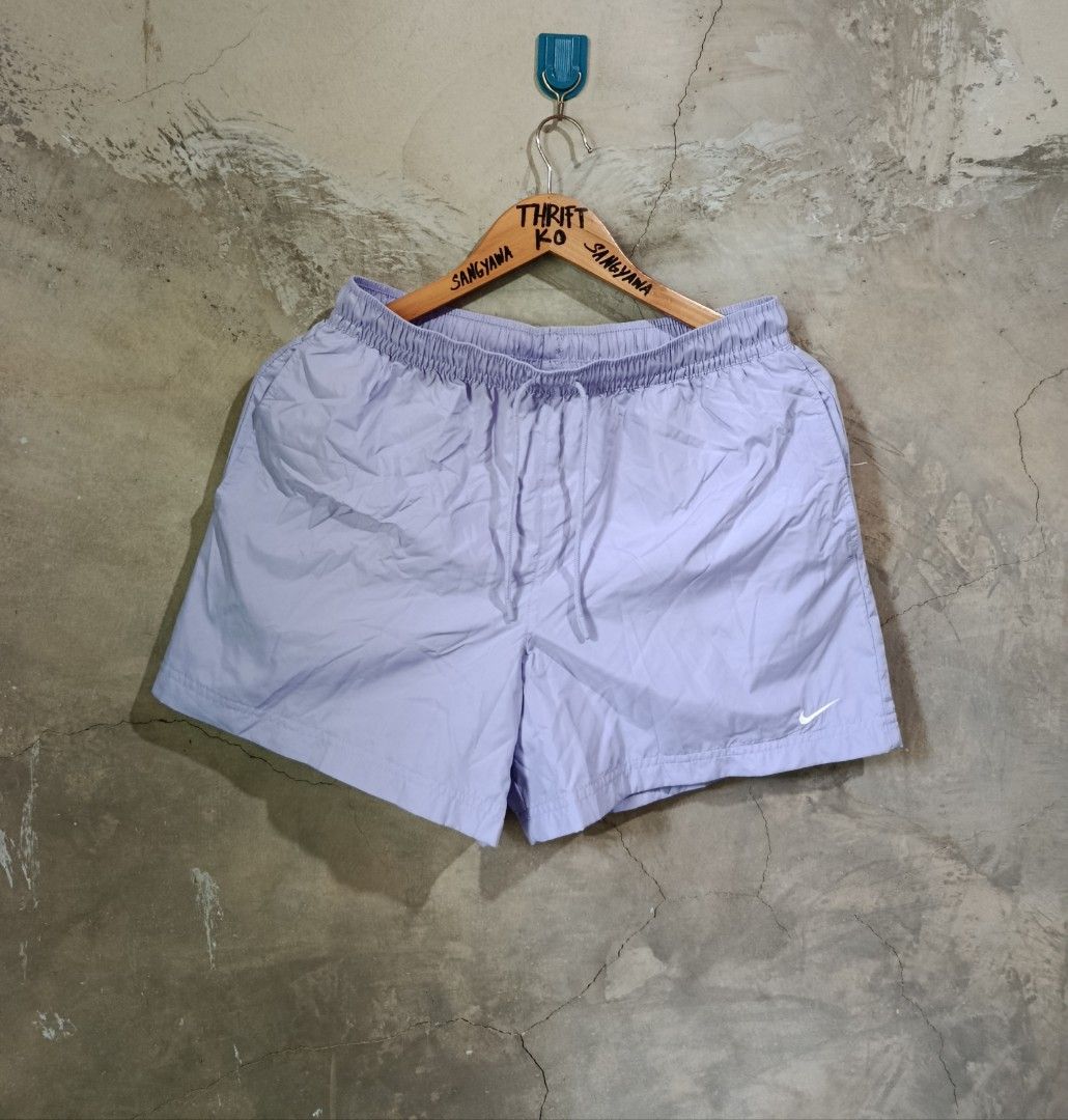 Nike Light Purple Drawstring Shorts (Category: Shorts) located in Kalamansig. Submitted by skone1996 (Listing ID 1470430223, Image 1). Description: - Brand: Nike - Color: Light Purple - Size: Medium - 28-32 Waistline - 14.5 Length - 10/10 Color rate - No issue - Style Code: FV7558-533 - Features: Drawstring waistband, breathable inner mesh lining, and embroidered white Nike swoosh near the hem - Condition: Clean, smoke-free home.