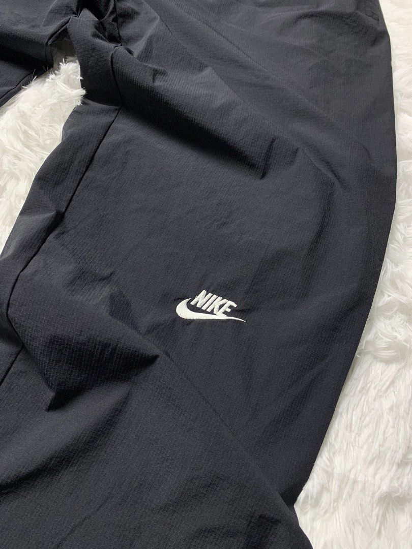 Nike Nylon Trackpants (Category: Activewear) located in Mandaluyong City. Submitted by ikonicpieces (Listing ID 1470533631, Image 3). Description: BASA MUNA BAGO BUMILI! Dimes: W: 28-44 L: 43 Front Rise: 13.5 Leg Hole: 4.5 - 8 (Ribbings) Size on tag: 3XL Color rate: 9/10 Condition: 9/10 Issue: Off MINE: 349 💳 PAYMENT: GCash / GoTyme 🚚 SHIPPING: J&T - Payment first before shipping. 📍 PLEASE NOTE -Thrifted item. Please manage your expectations. 