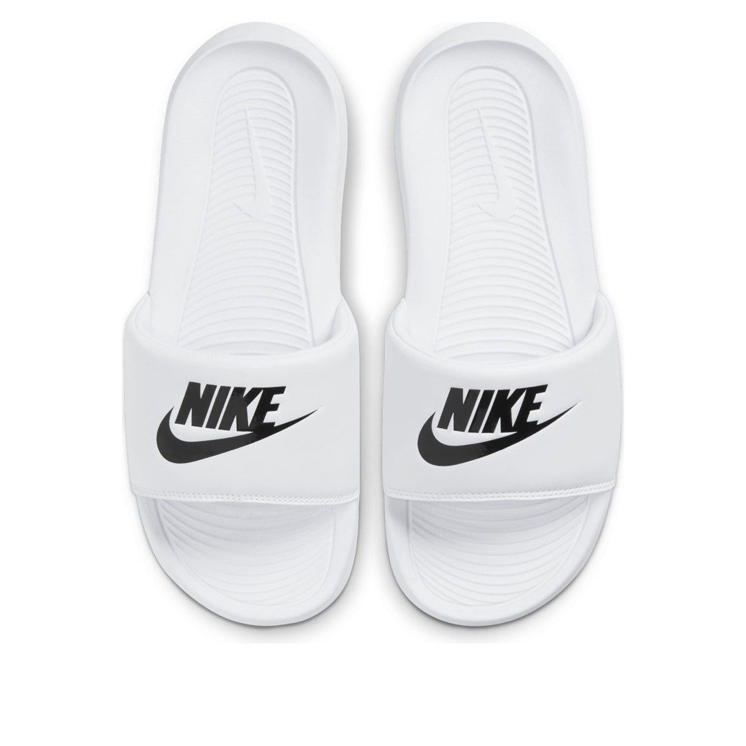 Nike Slides Size - 8 US (Category: Slippers & Slides) located in Cagayan de Oro. Submitted by rare.theory (Listing ID 1470357283, Image 1). Description: Size: 8 US (Men’s) Condition: Excellent✨ Color rate: 10/10 - Sign of used Mine: ₱850 + (sf) Loc: Iligan City, Mindanao. (CAN SHIP NATIONWIDE)🇵🇭.