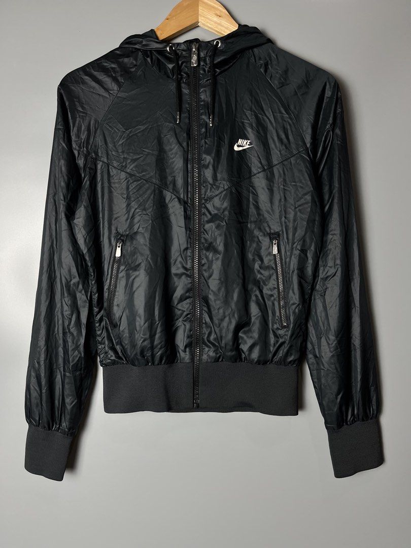Nike Sportswear The Windrunner Jacket Black Size S (Category: Coats, Jackets and Outerwear) located in Dagupan City. Submitted by loves2thrifth (Listing ID 1470422549, Image 1). Description: - Brand: Nike Sportswear - Item: The Windrunner Jacket - Color: Classic Black - Size: Small - Condition: Excellent / Pre-loved (as applicable) - Design: Iconic chevron chest panel, hooded with full zip front - Storage: Secure zippered side pockets - Fit: Snug